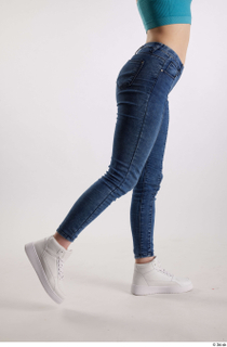 Rada  1 blue jeans casual dressed flexing leg side…